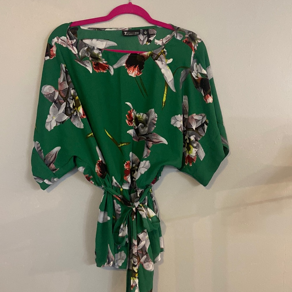 Green blouse belted